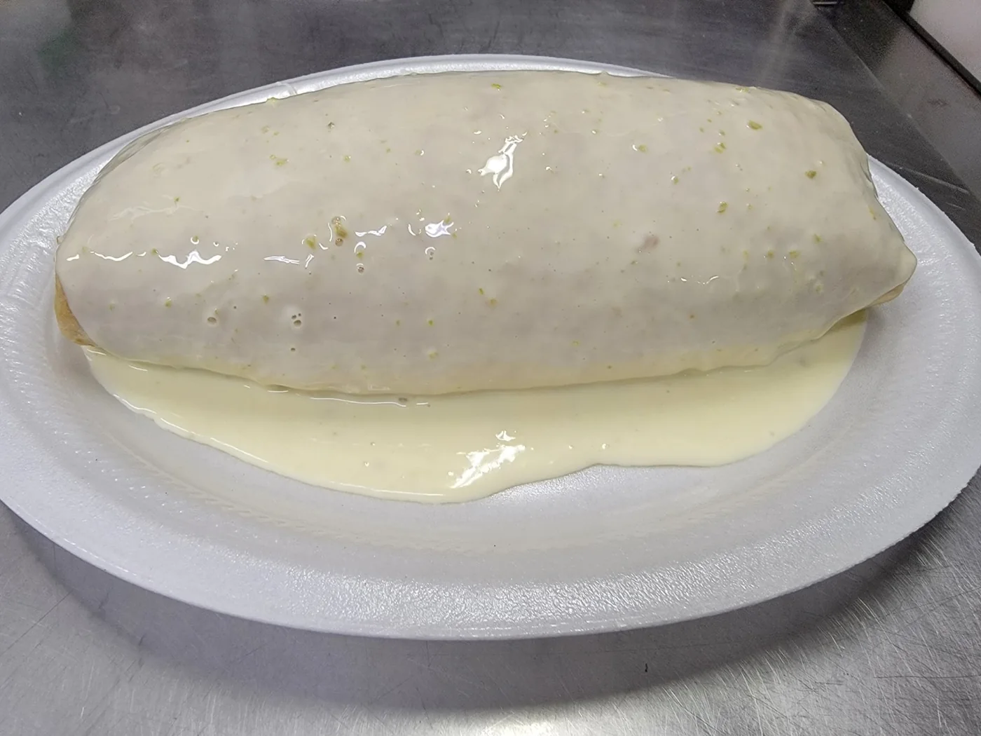 B-52 Burrito topped with cheese dip at Armored Tacos & Grill in Spring Lake NC